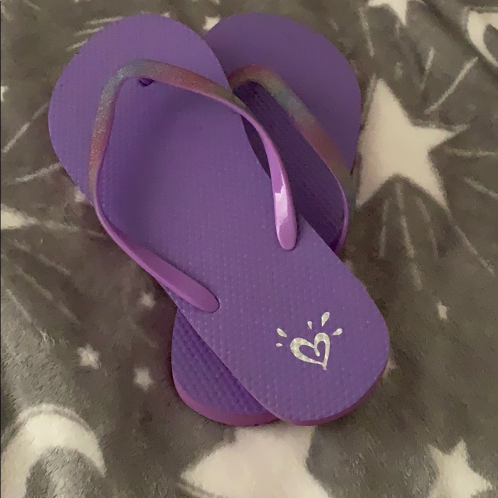 Purple flip flops, never worn